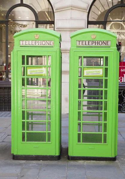 LONDON, UK - JULY 6, 2014: British red iconic phone box next to St. Paul's cathedral — Stock Photo, Image