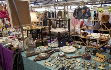 LONDON, UK - MAY 15, 2014: Antique display Greenwich market. Famous place to buy an art, crafts, antiques etc. clipart