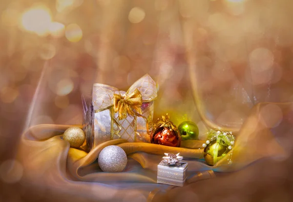 Christmas background with silver balls and present — Stock Photo, Image