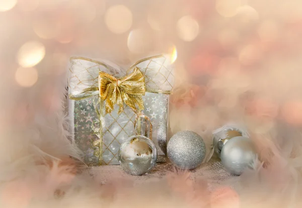 Christmas background with silver balls and present — Stock Photo, Image