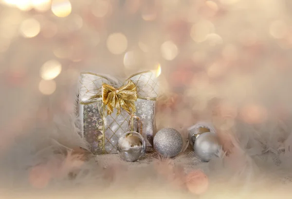 Christmas background with silver balls and present — Stock Photo, Image