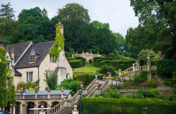 WILTSHIRE, CHIPPENHAM, UK - AUGUST 9, 2014: Castle Combe, unique old English village and luxury golf club — Stock Photo, Image