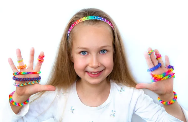 Loom bags craft. Little girl demonstrating her works. — Stock Photo, Image