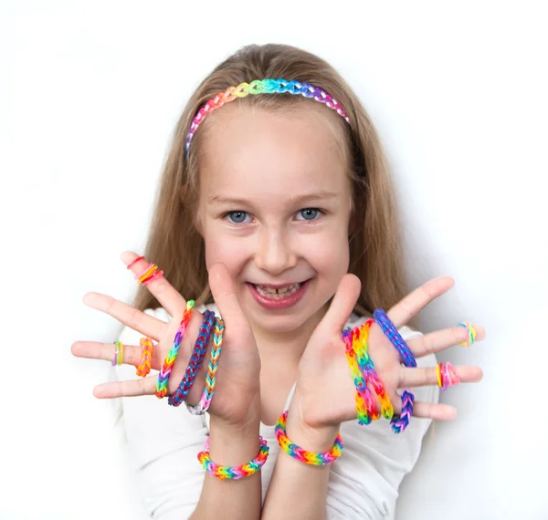Loom bags craft. Little girl demonstrating her works. — Stock Photo, Image