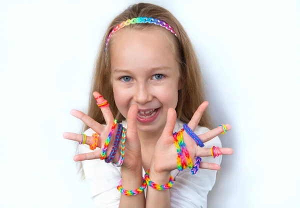 Loom bags craft. Little girl demonstrating her works. — Stock Photo, Image