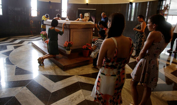 salvador, bahia, brazil - may 19, 2019: devotee visits the tomb of Santa Dulce dos Pobres in the city of Salvador.