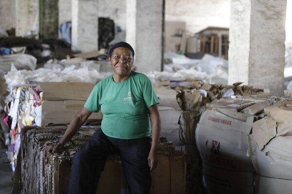 feira de santana, bahia, brazil - may 15, 2019: person sorting material to be recycled in a cooperative in the city of Feita de Santana.