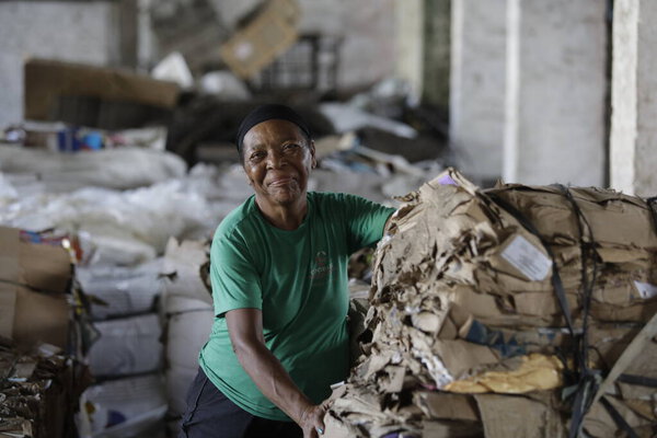 feira de santana, bahia, brazil - may 15, 2019: person sorting material to be recycled in a cooperative in the city of Feita de Santana.
