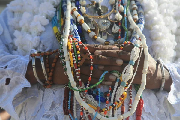 salvador, bahia, brazil - january 13, 2022: adept of the Candomble religion seen during a visit to the Basilica of Senhor do Bonfim in the city of Salavdor.