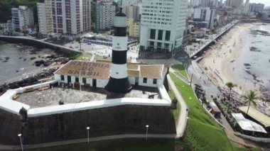 salvador, bahia, brazil - may 1, 2022: View of Santo Antonio Fort, better known as Barra lighthouse in Salvador city.