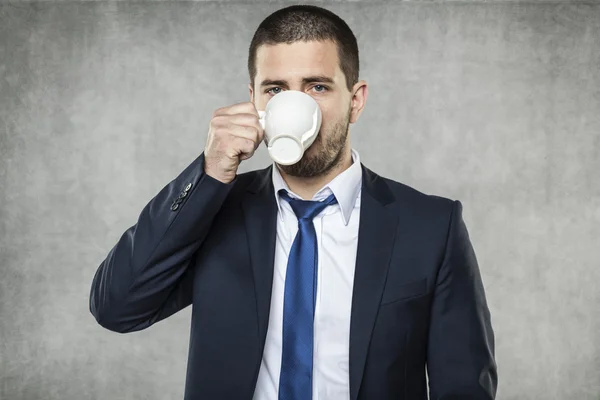 Businessman drinking coffee — Stock Photo, Image