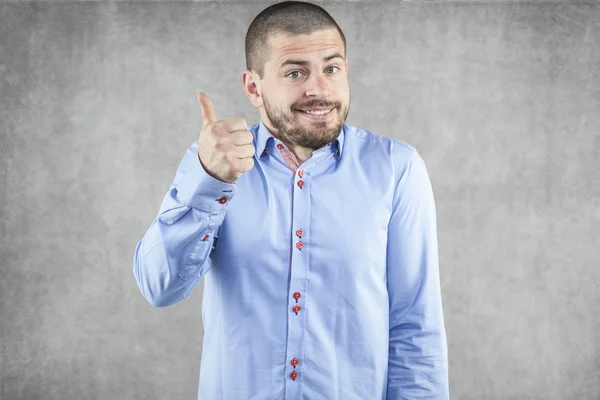 Young businessman with thumb raised up — Stock Photo, Image