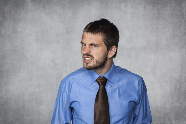 Face of evil businessman — Stock Photo, Image