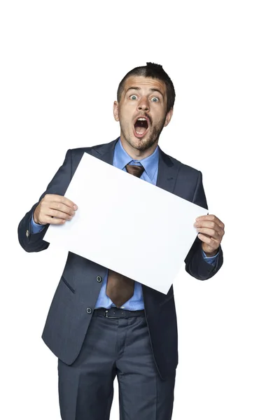 Podnikatel s legrační účes drží kus papíru — Stock fotografie