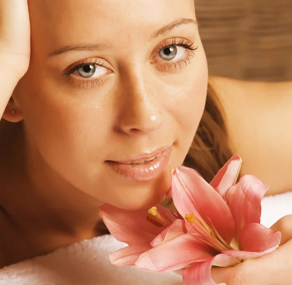 beauty young woman with flower