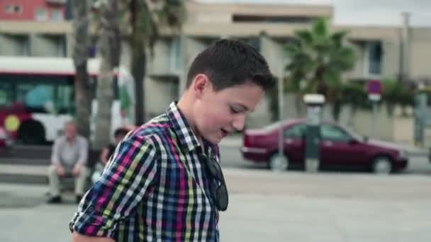 Boy using smartphone — Stock Video