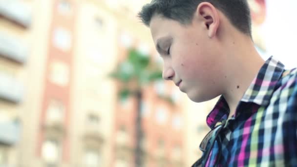 Boy sending text message — Stock Video