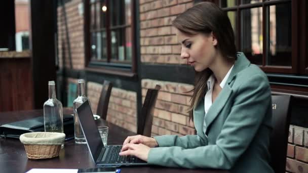 Happy businesswoman with laptop — Stock Video