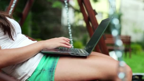 Woman hands typing on laptop — Stock Video