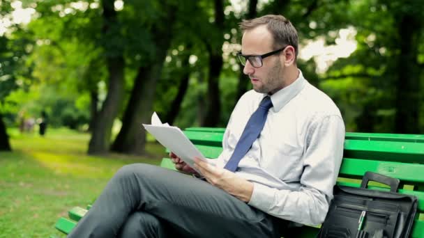 Businessman working with documents — Stock Video