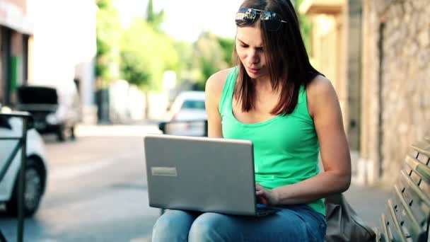 Pretty woman with laptop — Stock Video