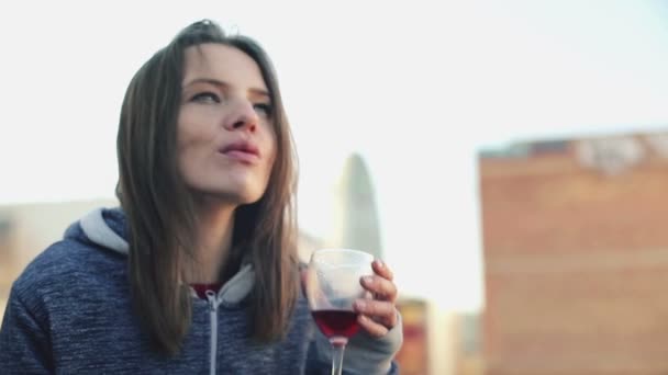 Pensive woman drinking wine — Stock Video