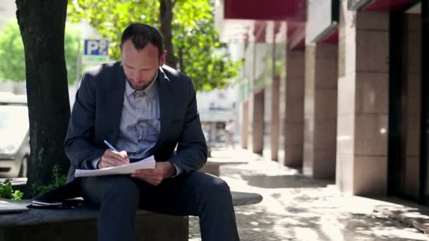 Businessman working with documents — Stock Video