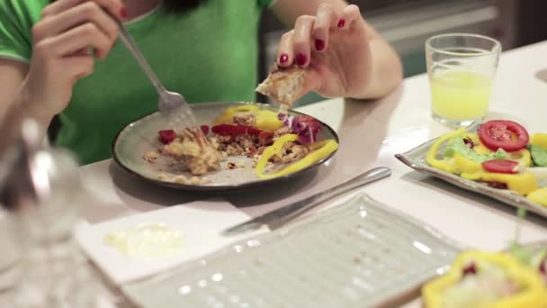 Woman hands eating eggs — Stock Video