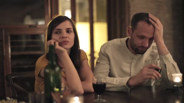 Bored couple in restaurant — Stock Video