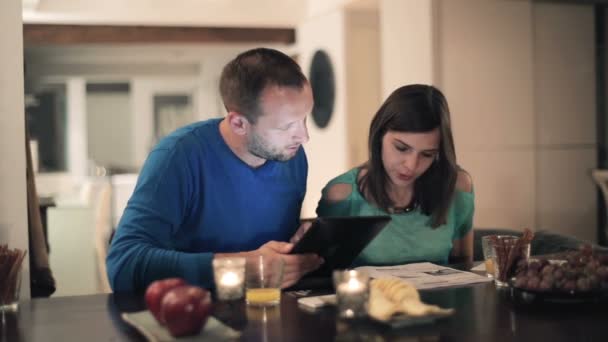 Couple calculating bills — Stock Video