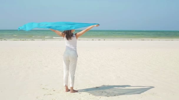 Woman with pareo on beach — Stock Video