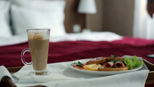 Wooden tray with breakfast — Stock Video