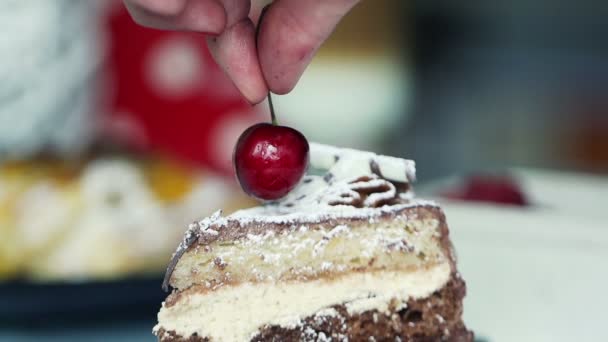 Decorating tasty cake with cheery — Stock Video