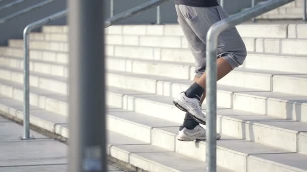 Man jogging up the stairs — Stock Video