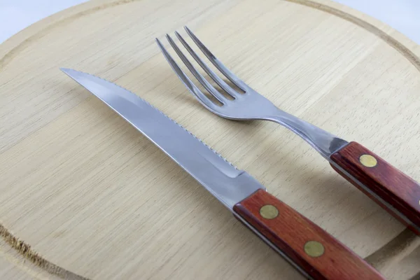 Platería sobre Plato de Madera Natural —  Fotos de Stock