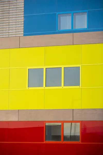 Modern office buildings. Colorful buildings in a industrial place. Yellow, blue and red windows. — Stock Photo, Image