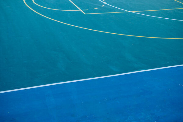 Basketball court shot during day