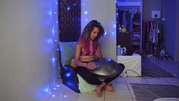 Woman Playing Hand Pan Home — Vídeo de stock