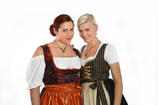 Two bavarian girls in traditional costumes — Stock Photo, Image