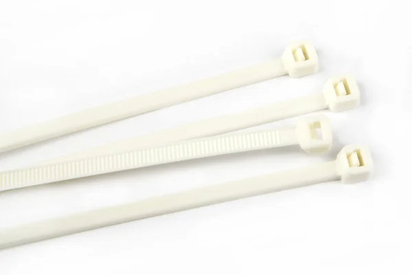 Close up of white cable ties — Stock Photo, Image