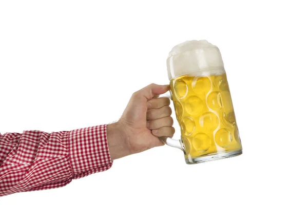 Man in traditional Bavarian shirt holds mug of beer — Stock Photo, Image