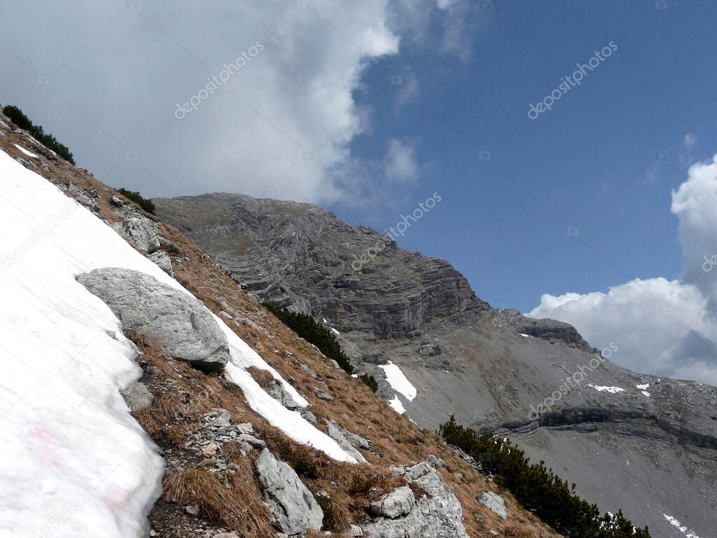 Mountain hiking tour to Daniel mountain in Tyrol, Austria in summertime
