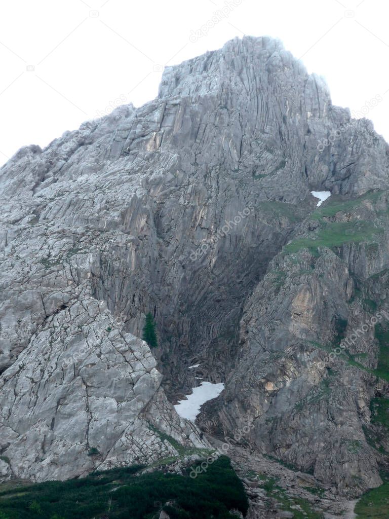 Via ferrata at high mountain lake Seebensee, Zugspitze mountain, Tyrol, Austria in summertime