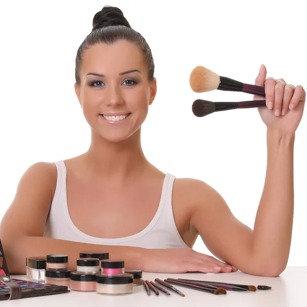 Beautiful smiling girl with brushes — Stock Photo, Image