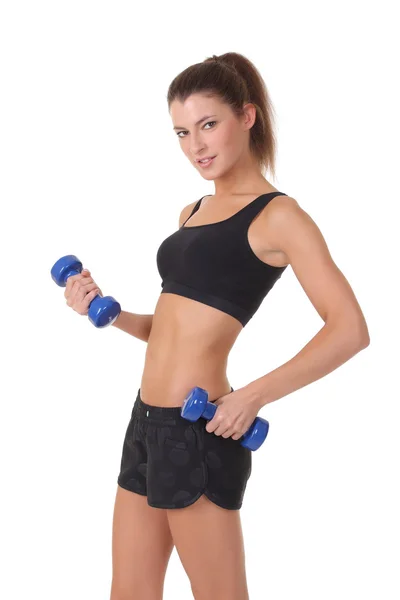 Chica deportiva con dumbbells.over fondo blanco — Foto de Stock