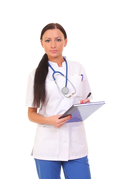 Young doctor writing in a medical report Stock Photo