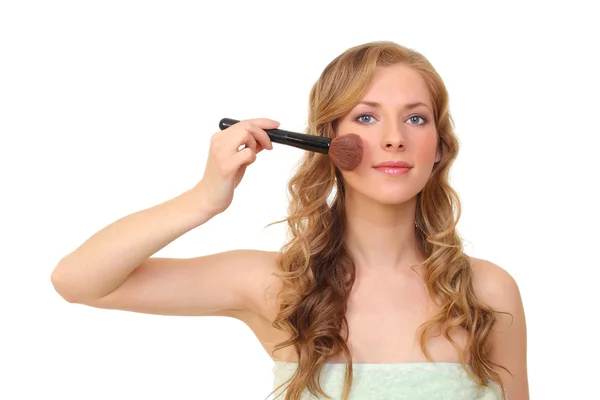 Mooie vrouw met een brush.on een witte achtergrond — Stockfoto