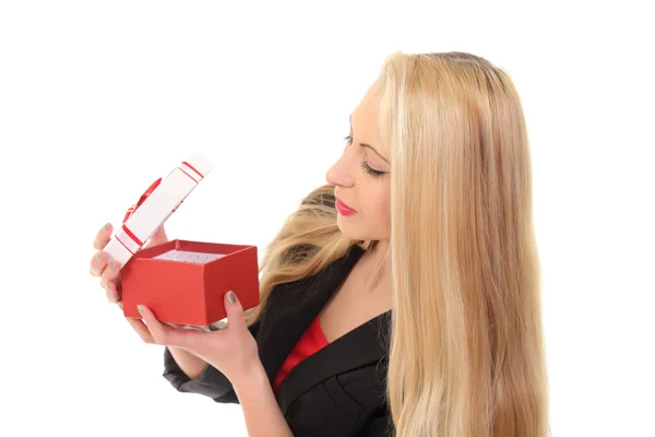 Beautiful girl with a gift box in hand — Stock Photo, Image