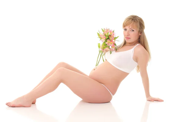 Mooie zwangere vrouw geïsoleerd op een witte achtergrond — Stockfoto