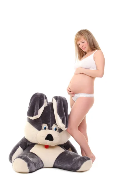 Mooie zwangere vrouw geïsoleerd op een witte achtergrond — Stockfoto